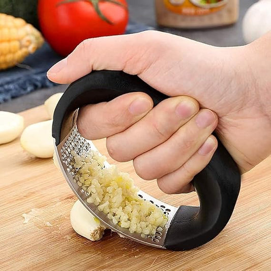 Garlic press crusher in stainless steel – compact kitchen tool for home and professional use